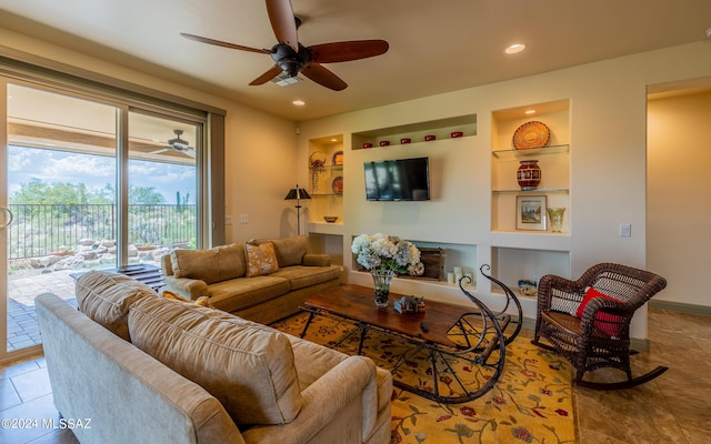 living room featuring tile patterned floors, baseboards, built in shelves, and recessed lighting