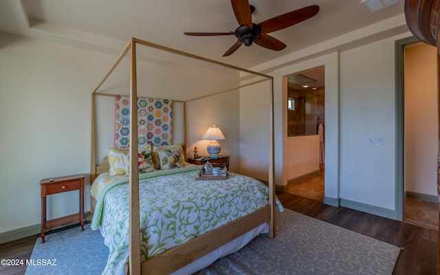 bedroom with ceiling fan and hardwood / wood-style floors