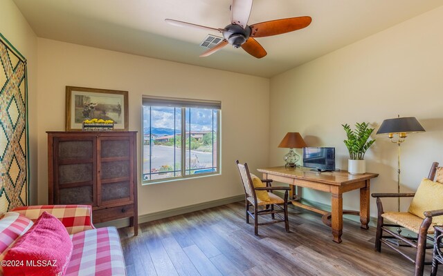 office space with ceiling fan and wood-type flooring