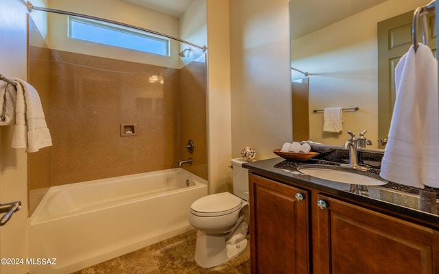 bathroom with vanity, toilet, and washtub / shower combination