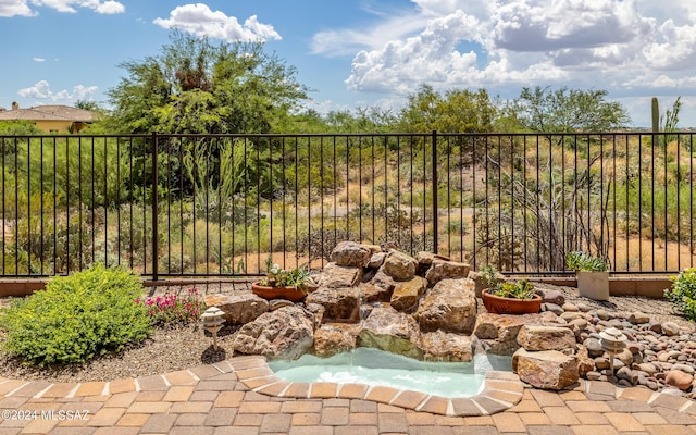 view of patio / terrace with fence