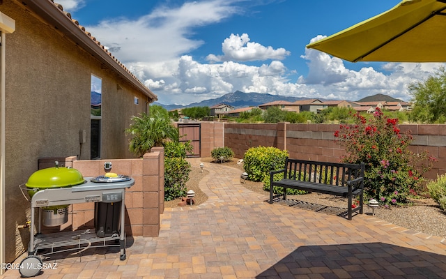 view of patio with a mountain view