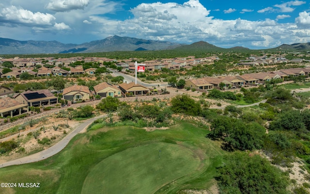 birds eye view of property with a mountain view and a residential view