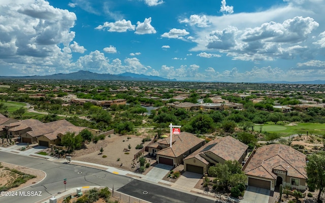 aerial view featuring a mountain view and a residential view