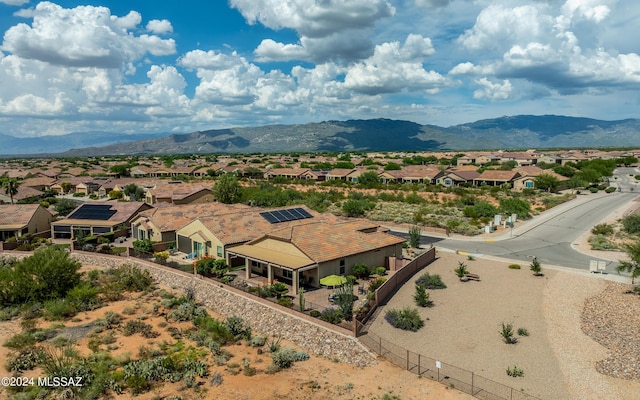 aerial view featuring a mountain view and a residential view