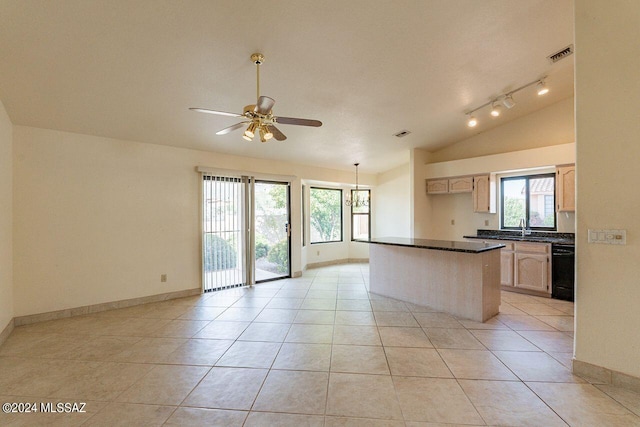 kitchen featuring ceiling fan, light tile patterned flooring, a healthy amount of sunlight, and rail lighting