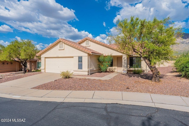 view of front of property featuring a garage