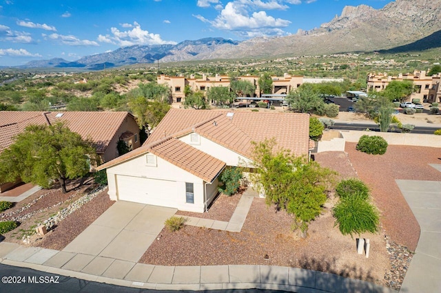 drone / aerial view featuring a mountain view