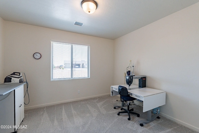 office space with light colored carpet