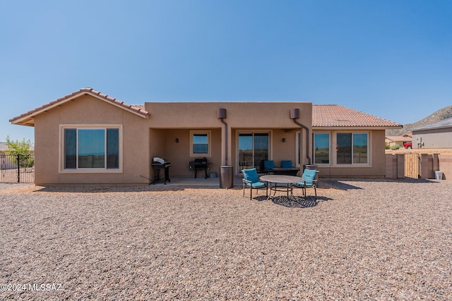 rear view of house featuring a patio area