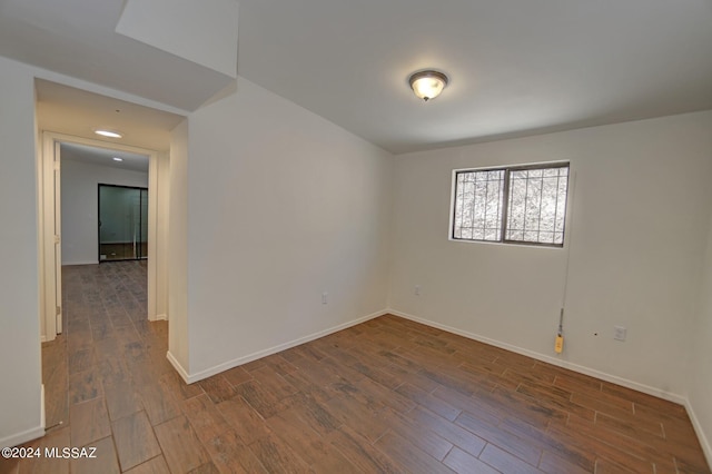 unfurnished room featuring hardwood / wood-style floors