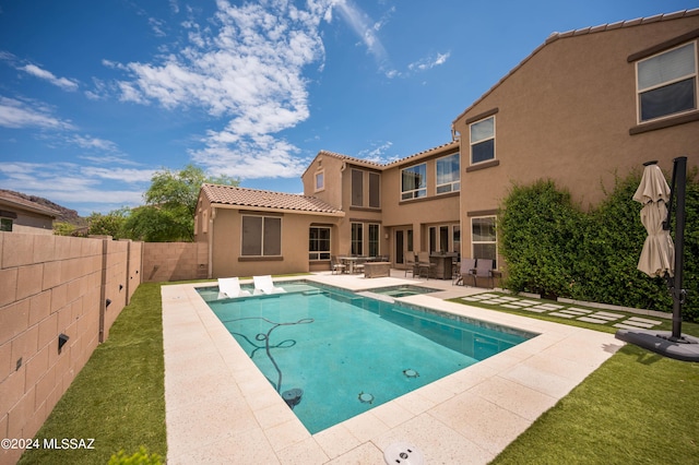 view of pool featuring a patio