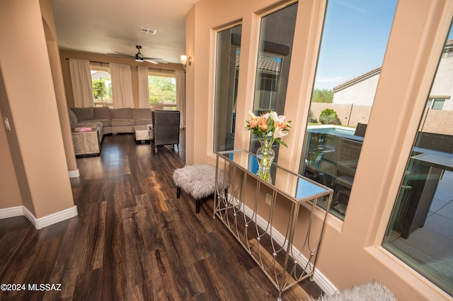 hall with dark hardwood / wood-style floors