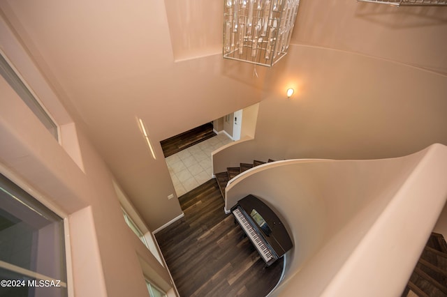 stairs with hardwood / wood-style flooring