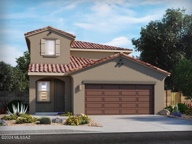 mediterranean / spanish-style house featuring a garage