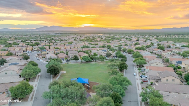 aerial view at dusk with a mountain view