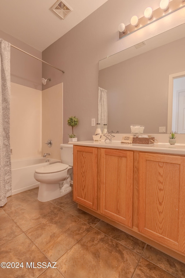 full bathroom with toilet, shower / tub combo, vanity, and tile patterned flooring