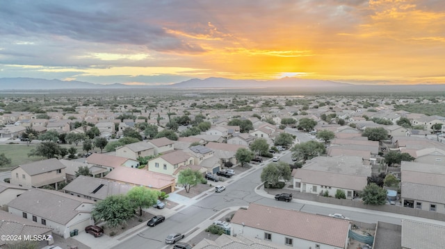 aerial view at dusk with a mountain view