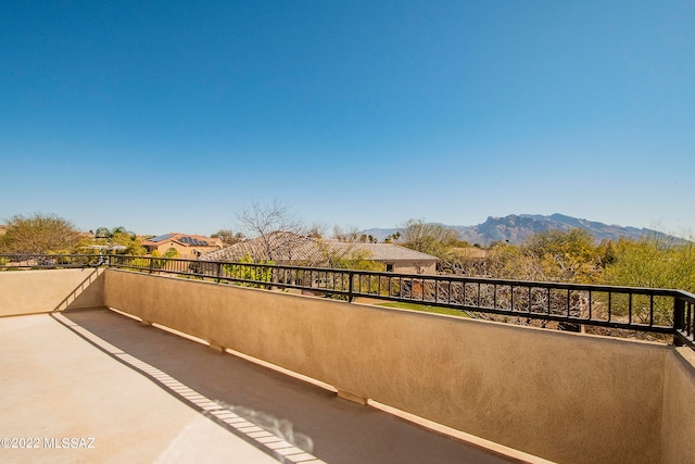 balcony featuring a mountain view