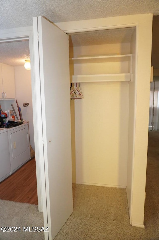 closet featuring separate washer and dryer