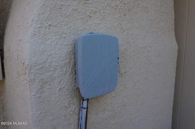 details featuring stucco siding