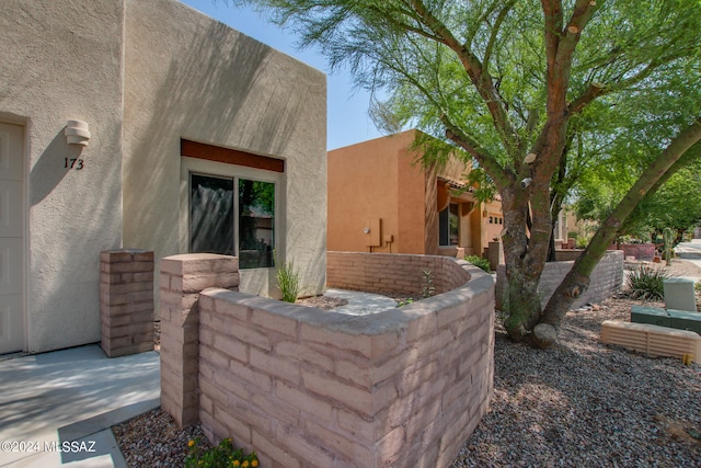 exterior space with stucco siding