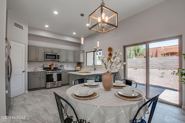 dining room with recessed lighting, visible vents, and an inviting chandelier