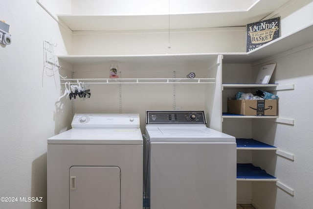 laundry room featuring washing machine and dryer