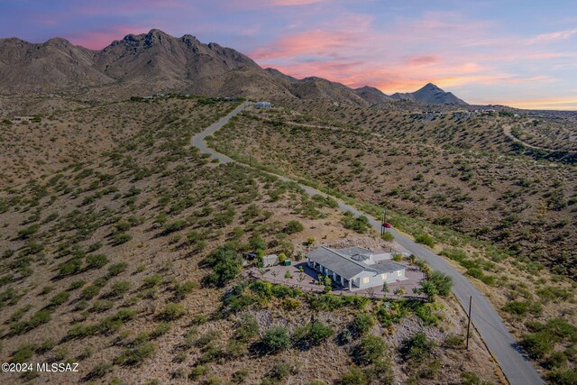 aerial view at dusk with a mountain view