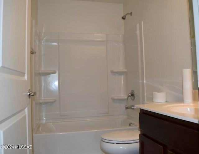 full bathroom featuring shower / bathtub combination, vanity, and toilet