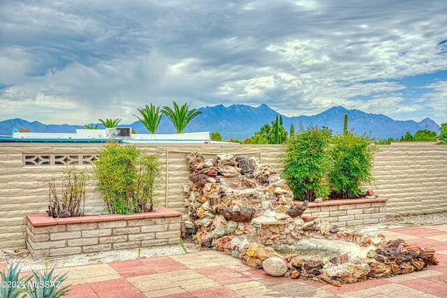 exterior space featuring a mountain view