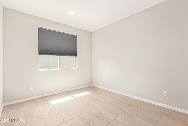 view of tiled spare room