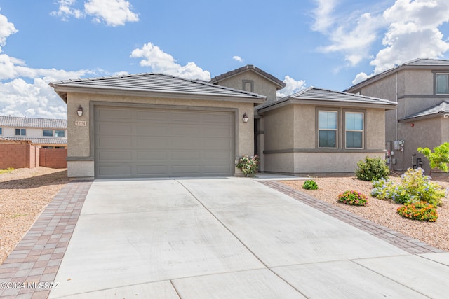 view of front of home with a garage