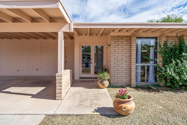 entrance to property featuring french doors