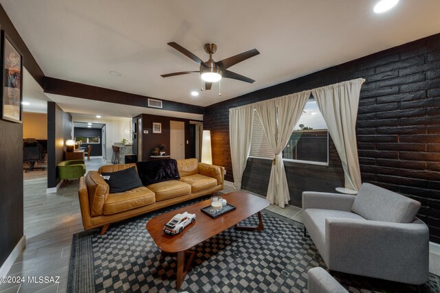 living room featuring ceiling fan