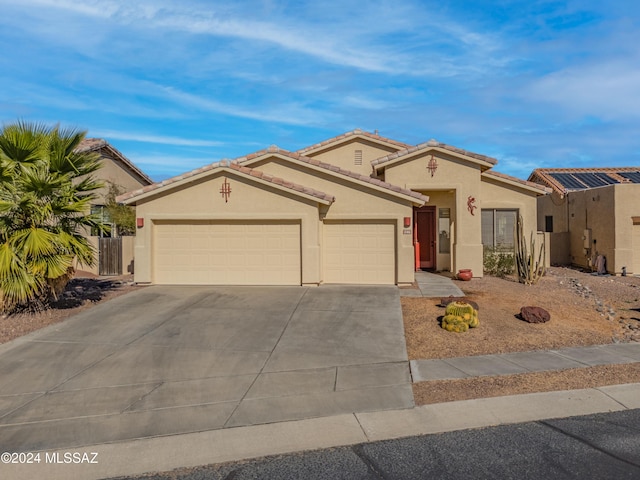 view of front of home with a garage