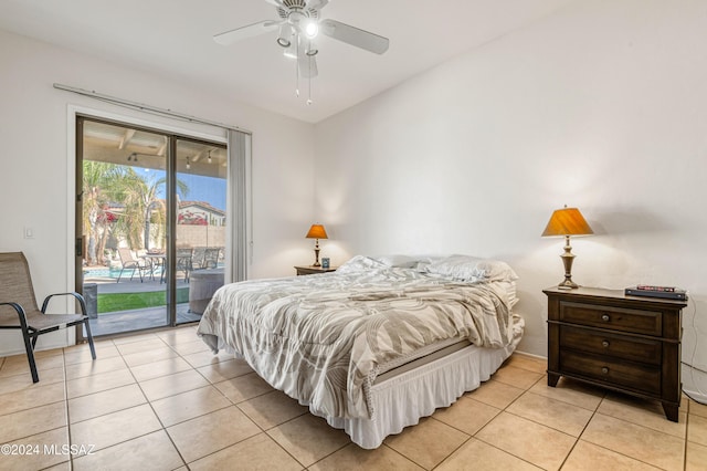 bedroom featuring access to outside, ceiling fan, and light tile patterned flooring