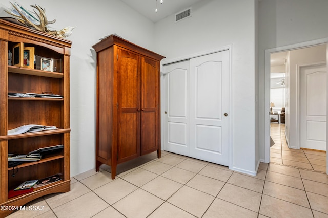 hallway with light tile patterned floors