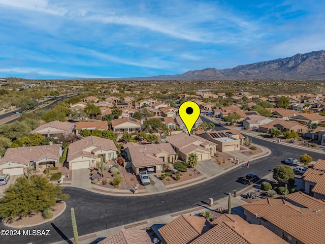 drone / aerial view featuring a mountain view