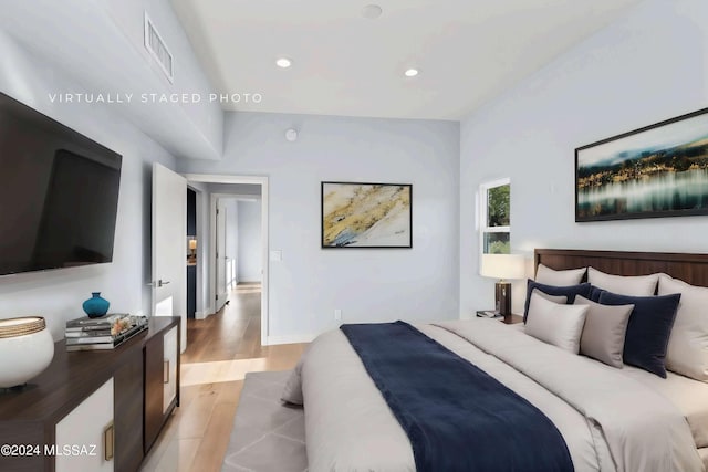 bedroom featuring light wood-type flooring