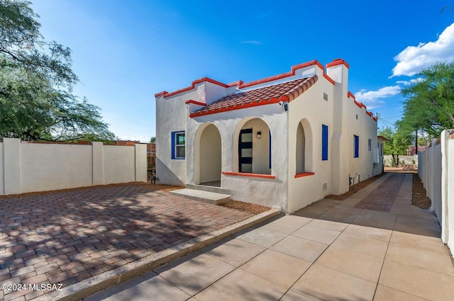 rear view of property with a patio