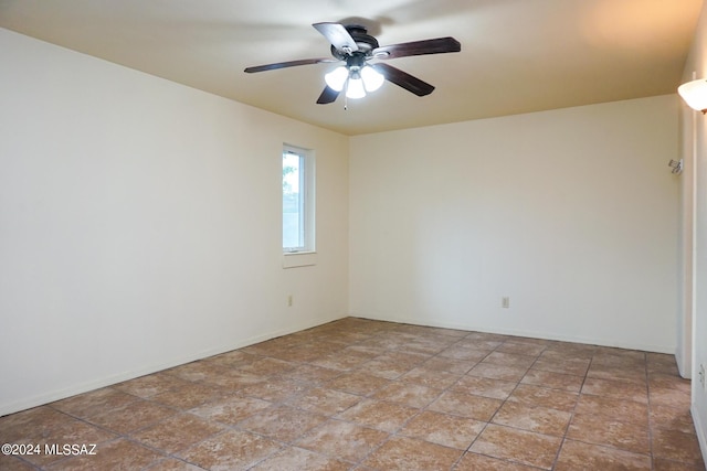 unfurnished room featuring ceiling fan