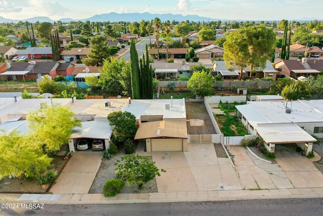 drone / aerial view featuring a mountain view and a residential view