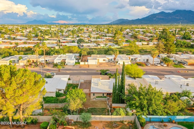 birds eye view of property with a residential view and a mountain view