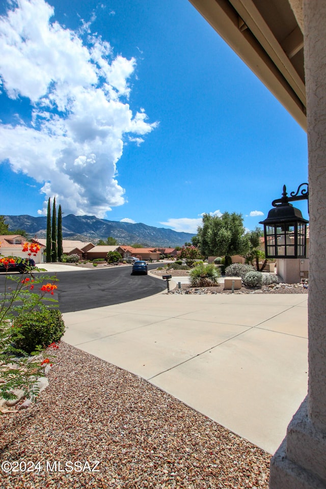 view of patio / terrace with a mountain view