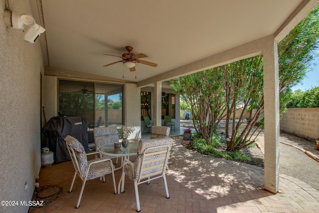 view of patio / terrace featuring grilling area and ceiling fan