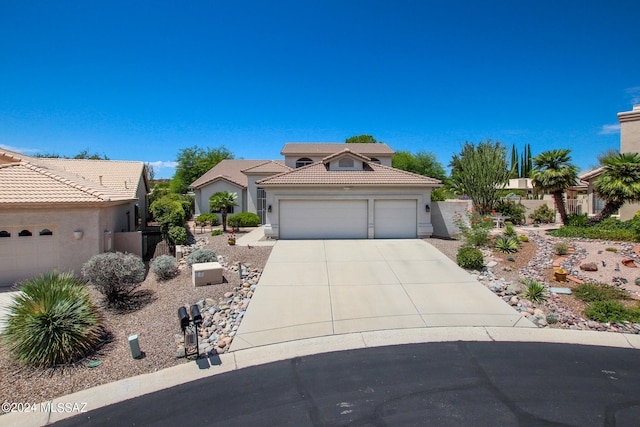 view of front of property featuring a garage