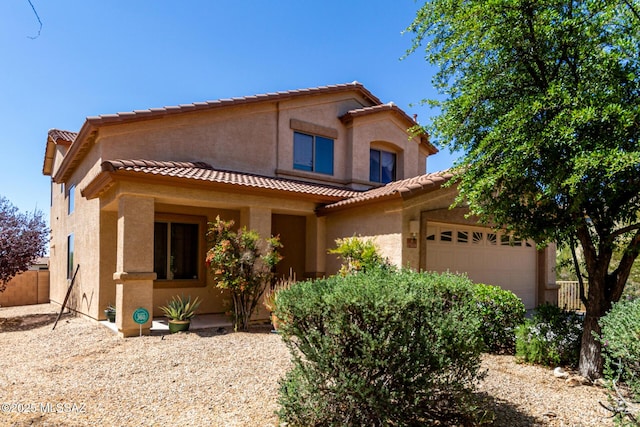 17616 S Vermillion Sunset Dr, Vail, AZ 85641 - mediterranean / spanish home with an attached garage, a tile roof, and stucco siding