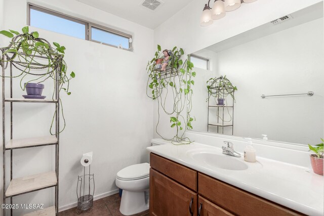 kitchen featuring tile patterned floors, a center island, and white appliances