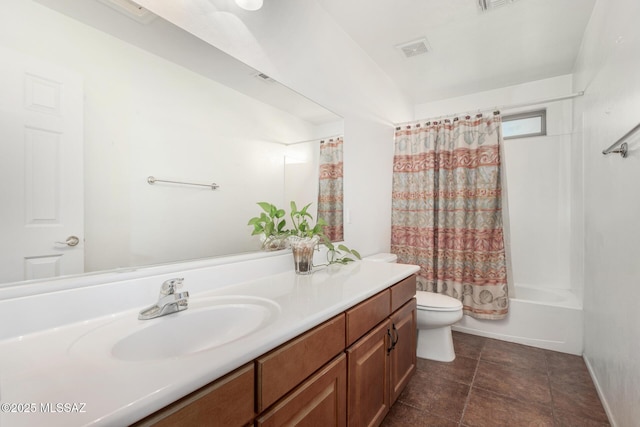 full bathroom with toilet, vanity, tile patterned floors, and visible vents